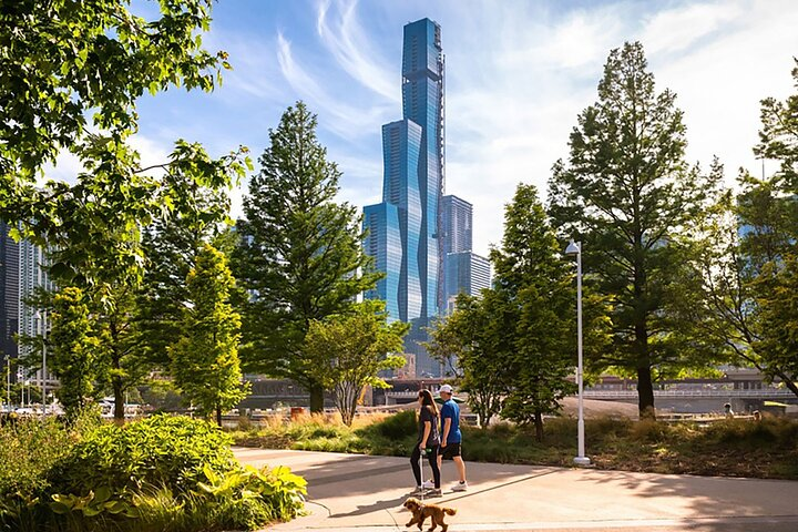 Discover Chicago's latest architectural marvels while strolling through lush greens observing unique designs that blend modernity with history and appreciating the evolving cityscape during this engaging walking tour.